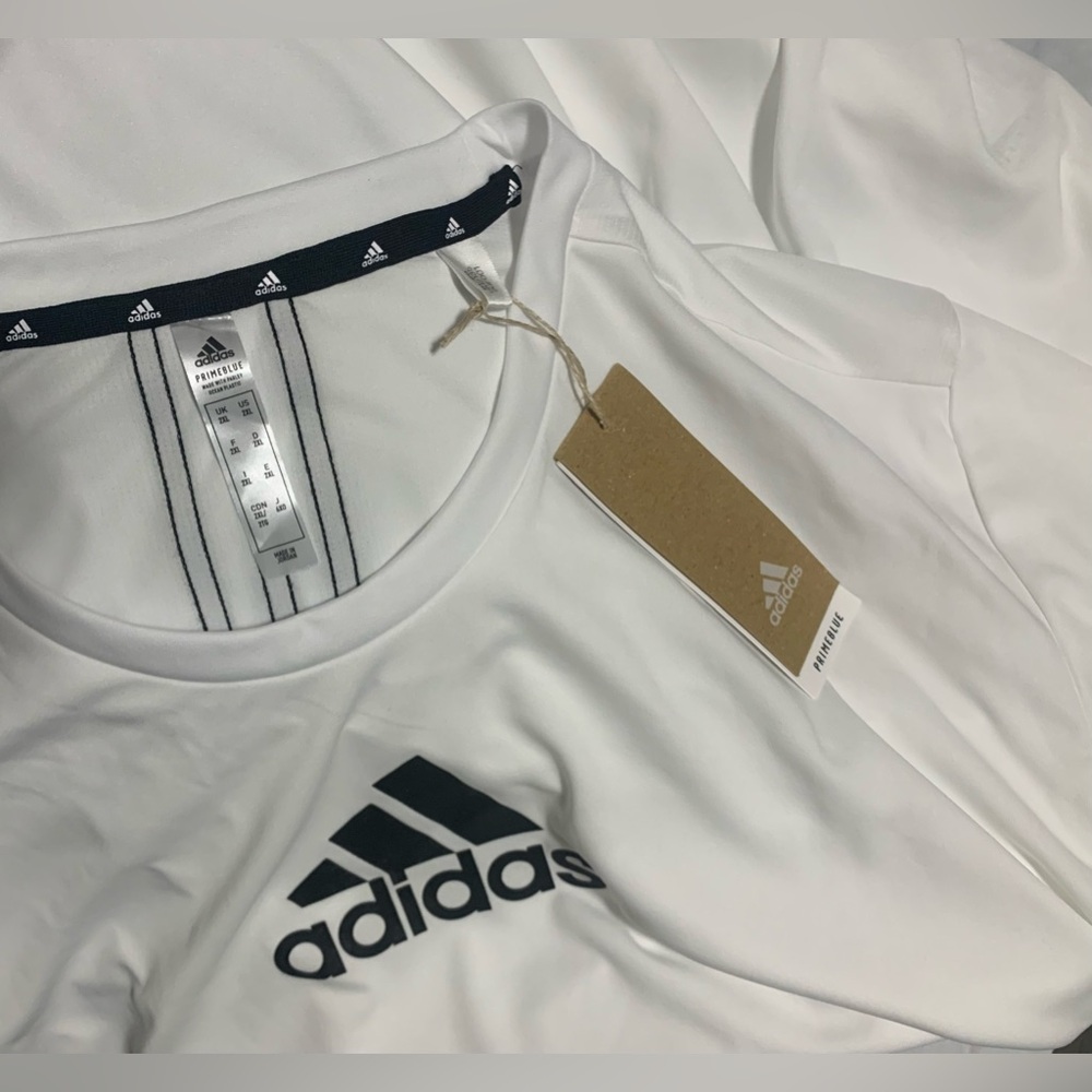 Men's white adidas shirt (NWT)